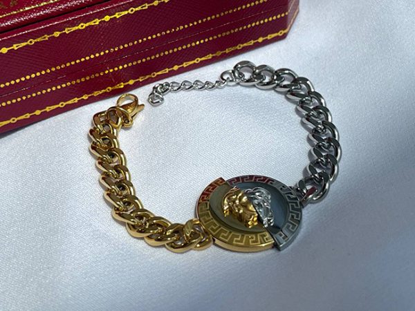 دستبند ورساچ دو رنگ نقره ای و طلایی