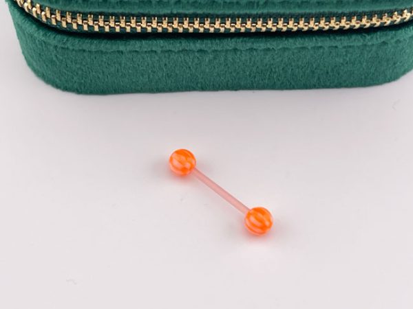 پیرسینگ نارنجی پلاستیکی لپ و زبان و نیپل